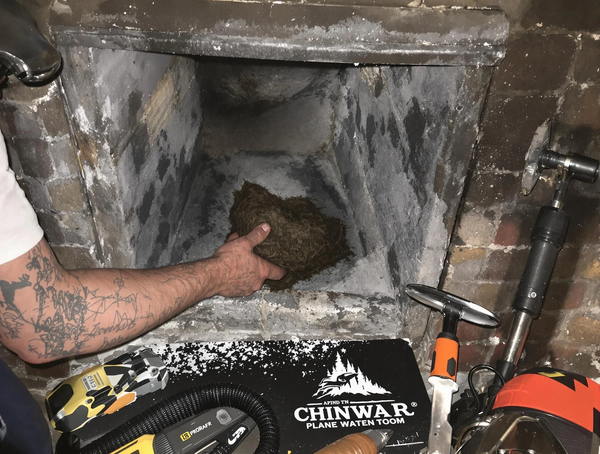 New Kensington Chimney Sweep safely removing debris and screening chimney in New Kensington, PA